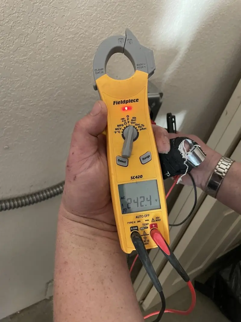 Voltage testing with clamp meter during Hot Tub / Pool Electrical Wiring in Bennett